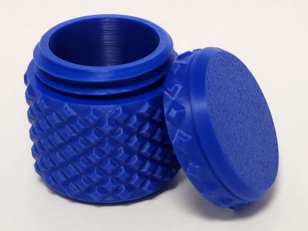 Threaded small container w/ texture