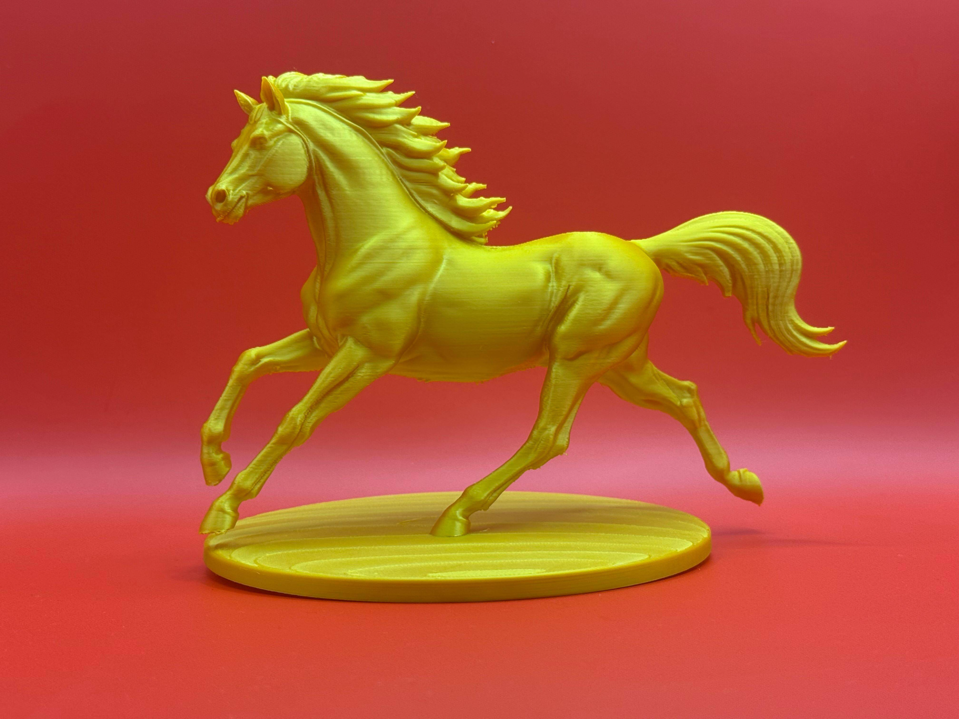 Running horse statue