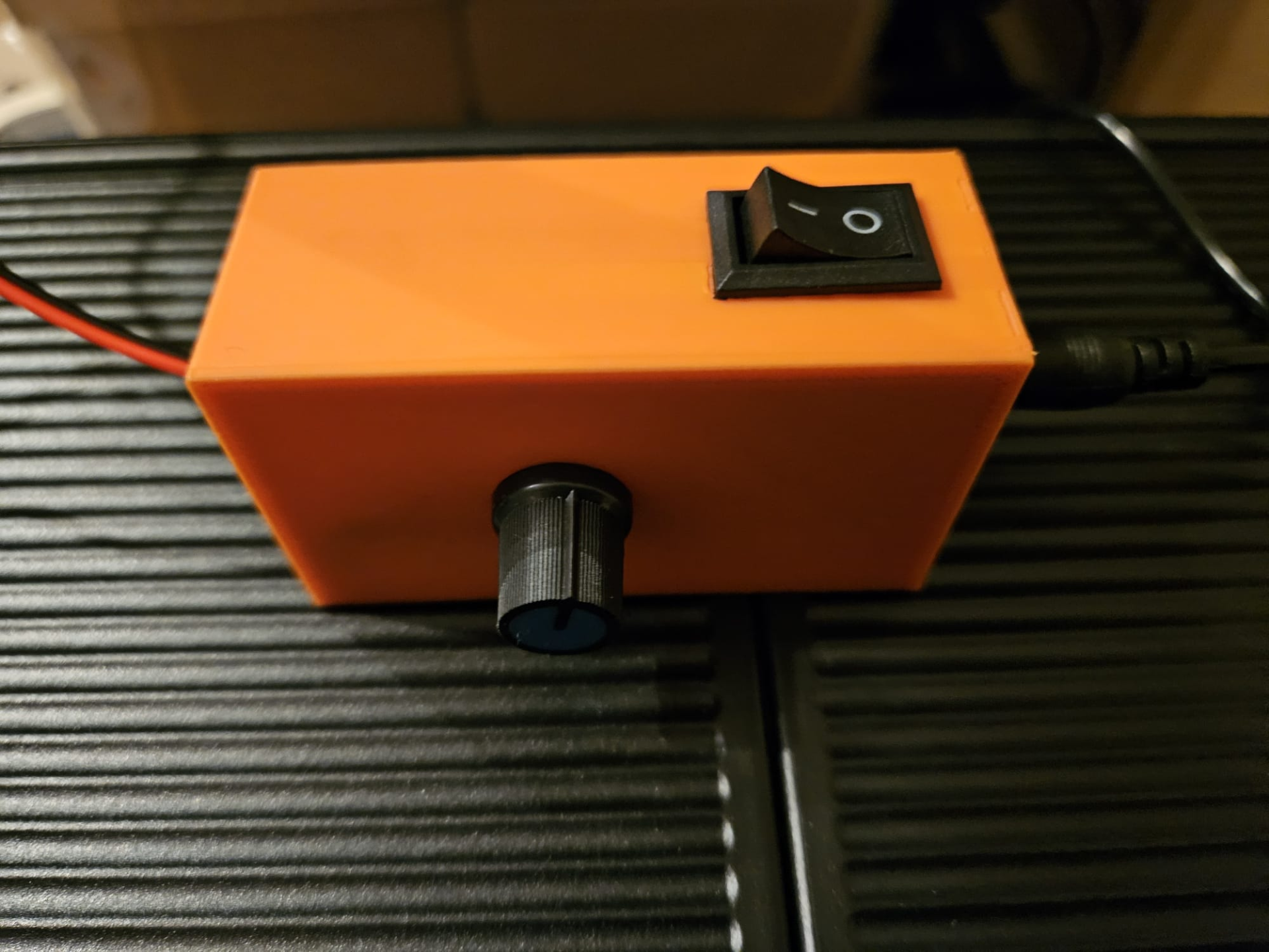 Housing for potentiometer with a switch