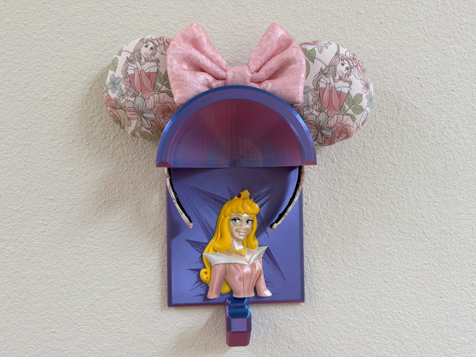Sleeping Beauty ear wall display & backpack hanger