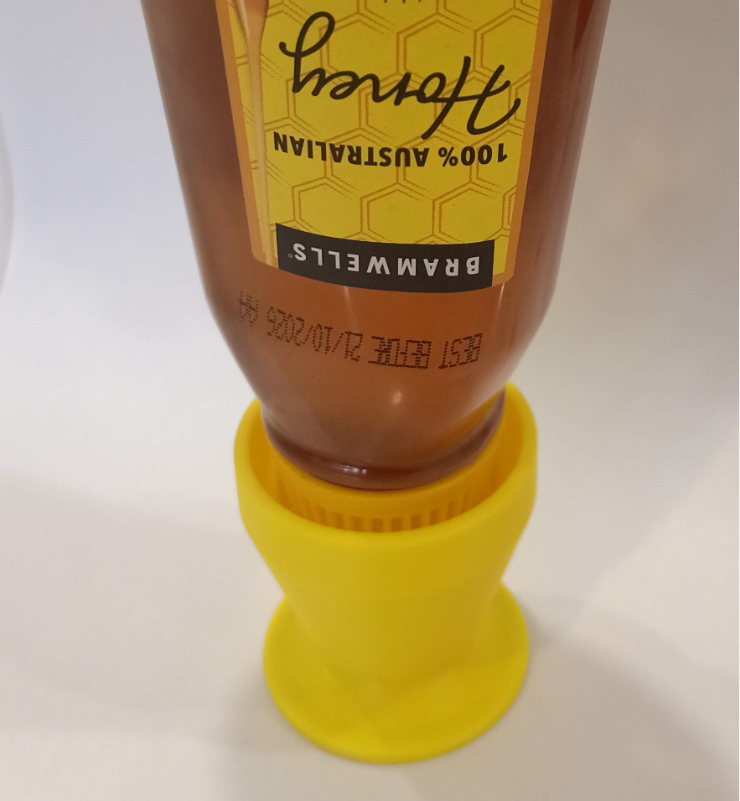 Bottle stand to invert honey or sauce bottles V1