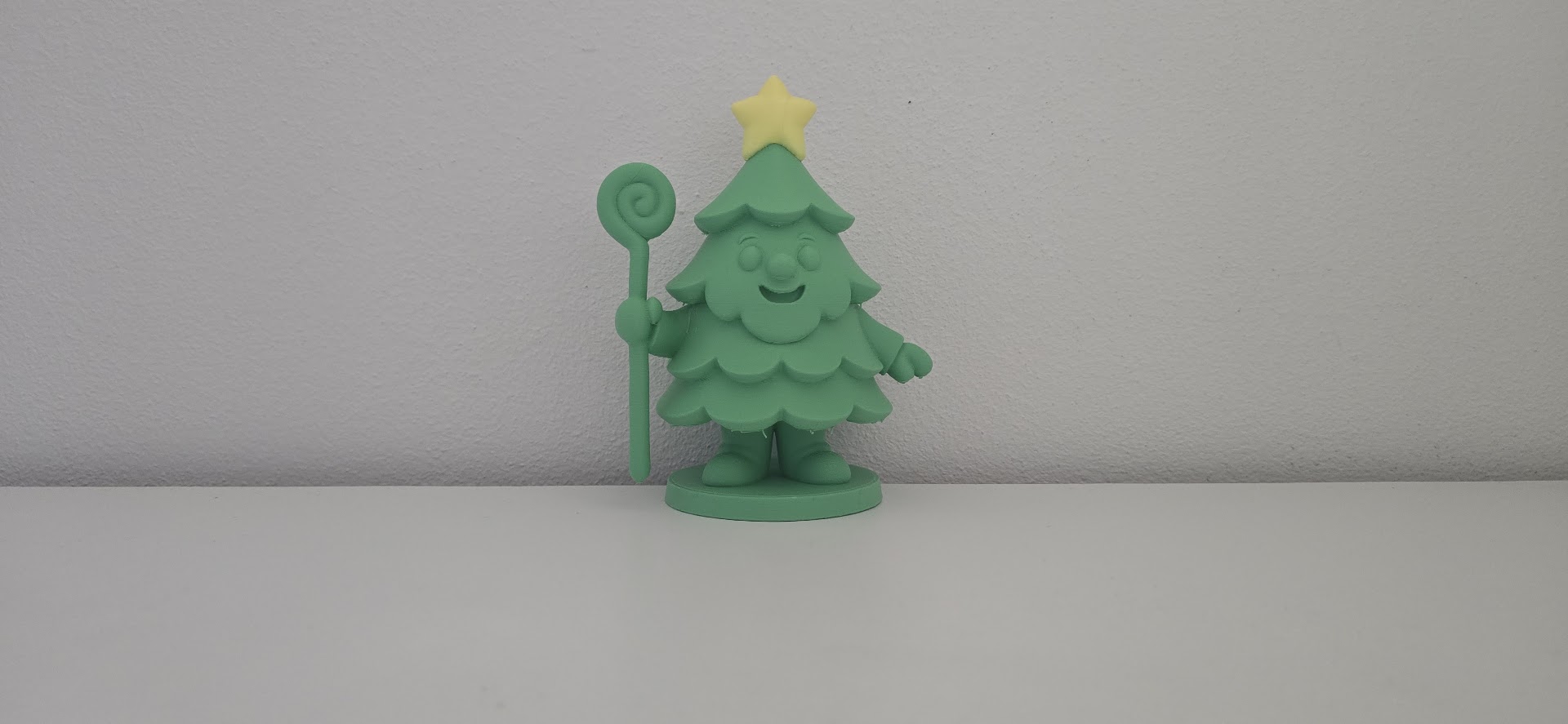 Smiling Christmas Tree Character with Star
