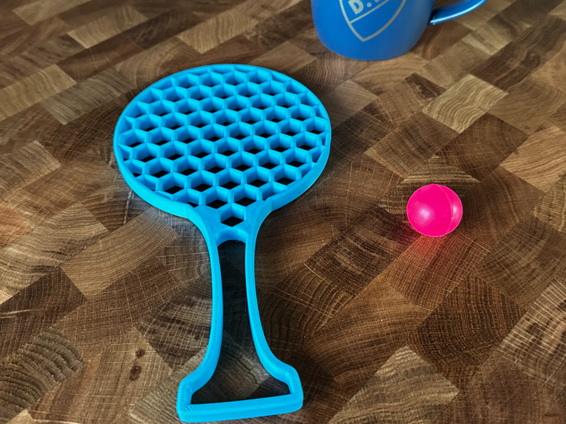 Toy tennis racket, table tennis.