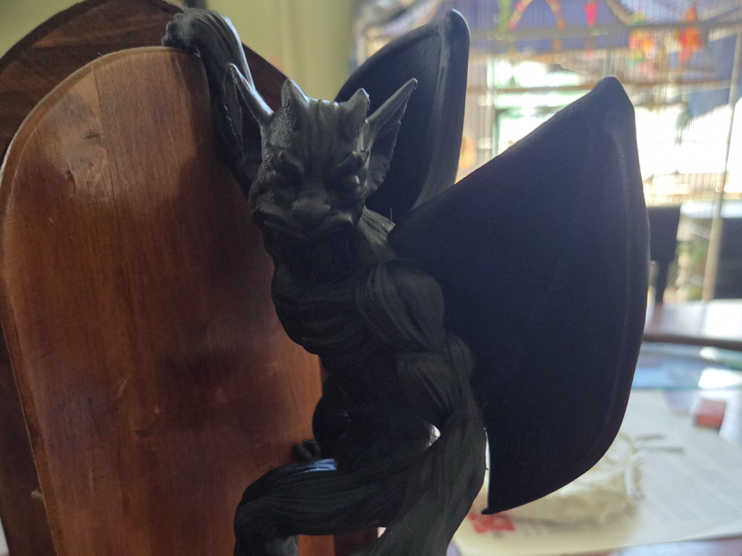 gargoyle plant/fence hanger
