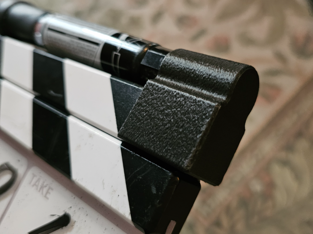 Clapperboard Dry-erase marker clamp