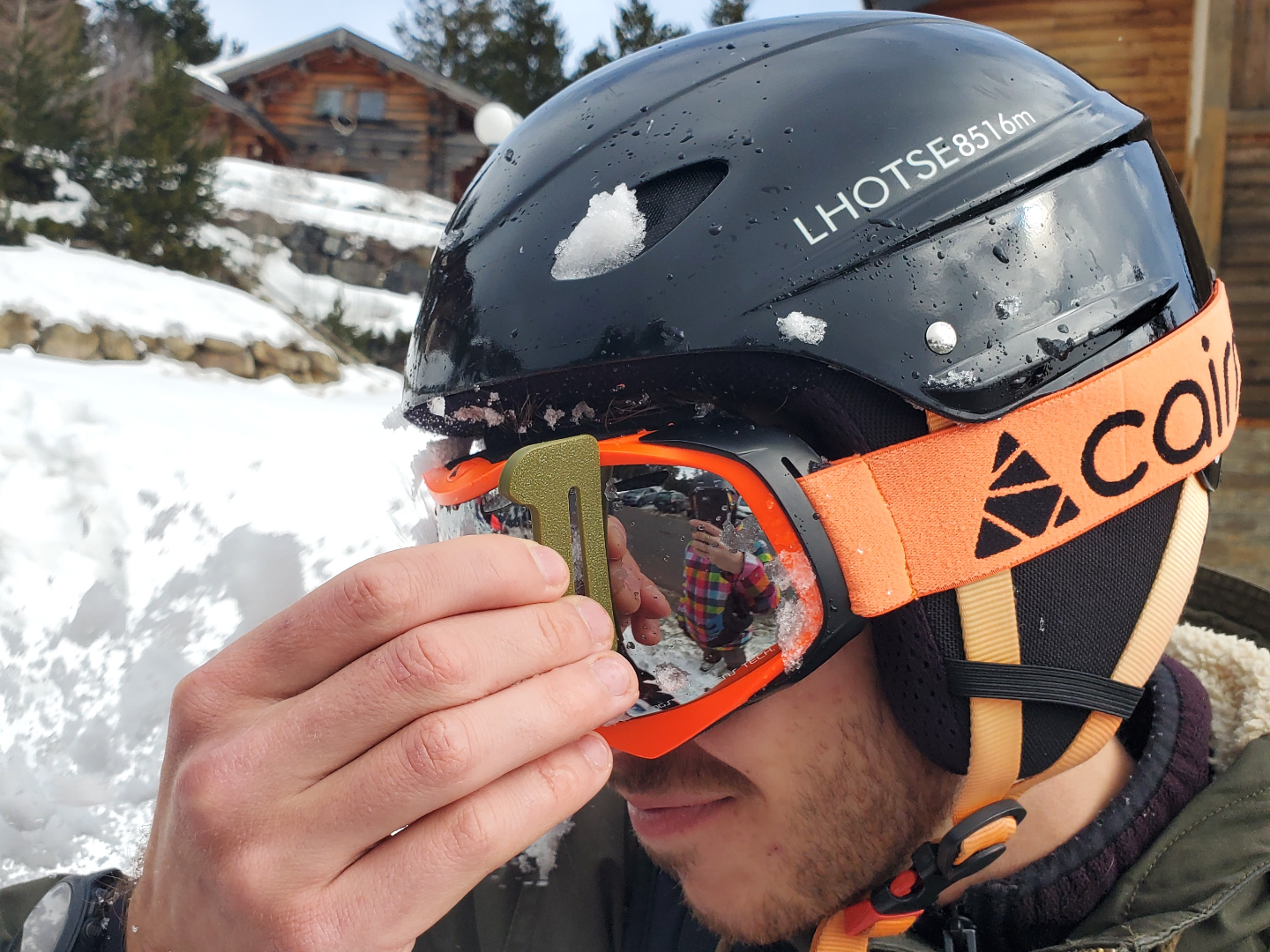 Clip-On Ski Goggle Scraper with Bottle Opener