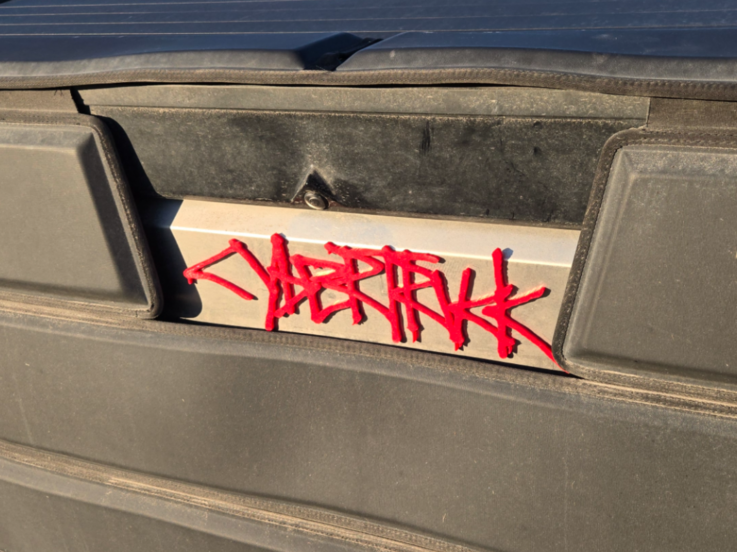 Cybertruck magentic scrypt logo