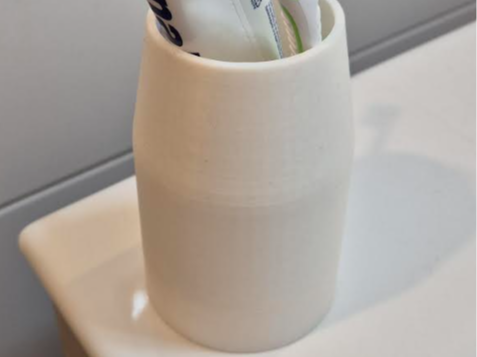 Pot brosse à dent avec fond récupérateur d'eau