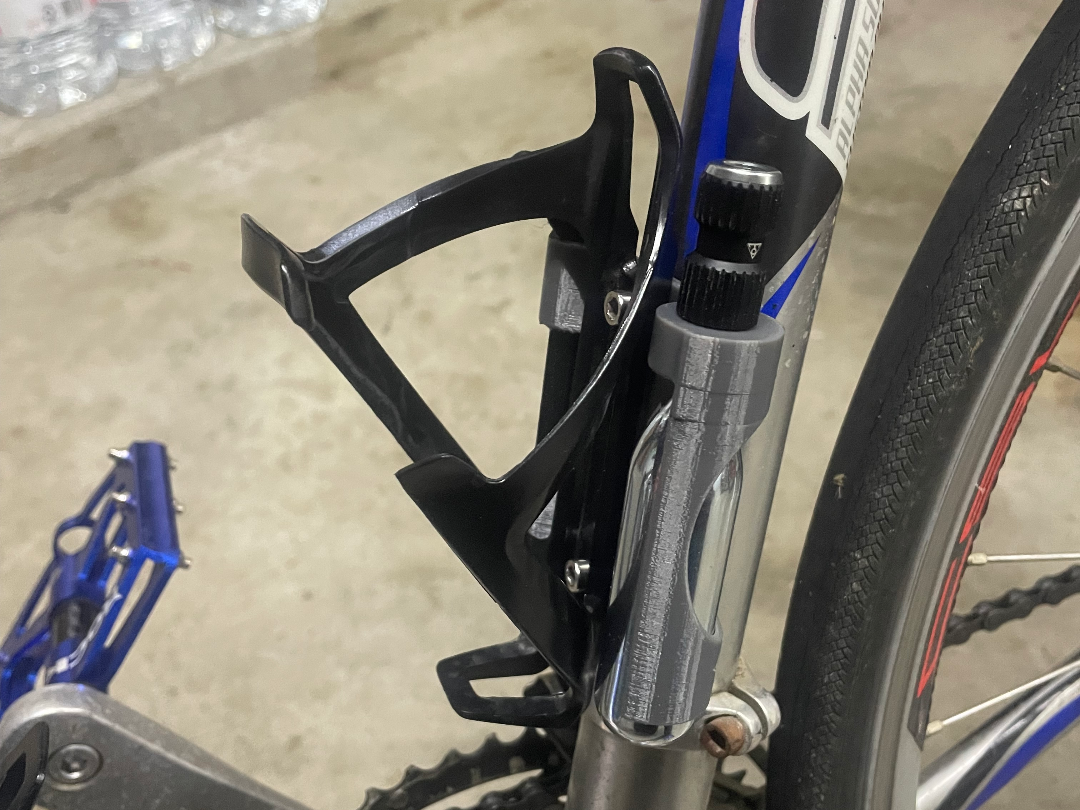 CO2 & Tire Lever Holder Behind Bottle Mount