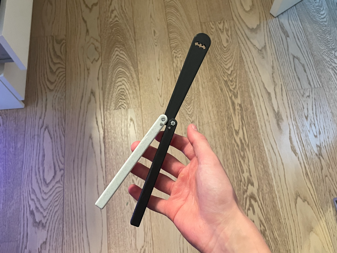 calibrated balisong v 3 with batman blade squiddy