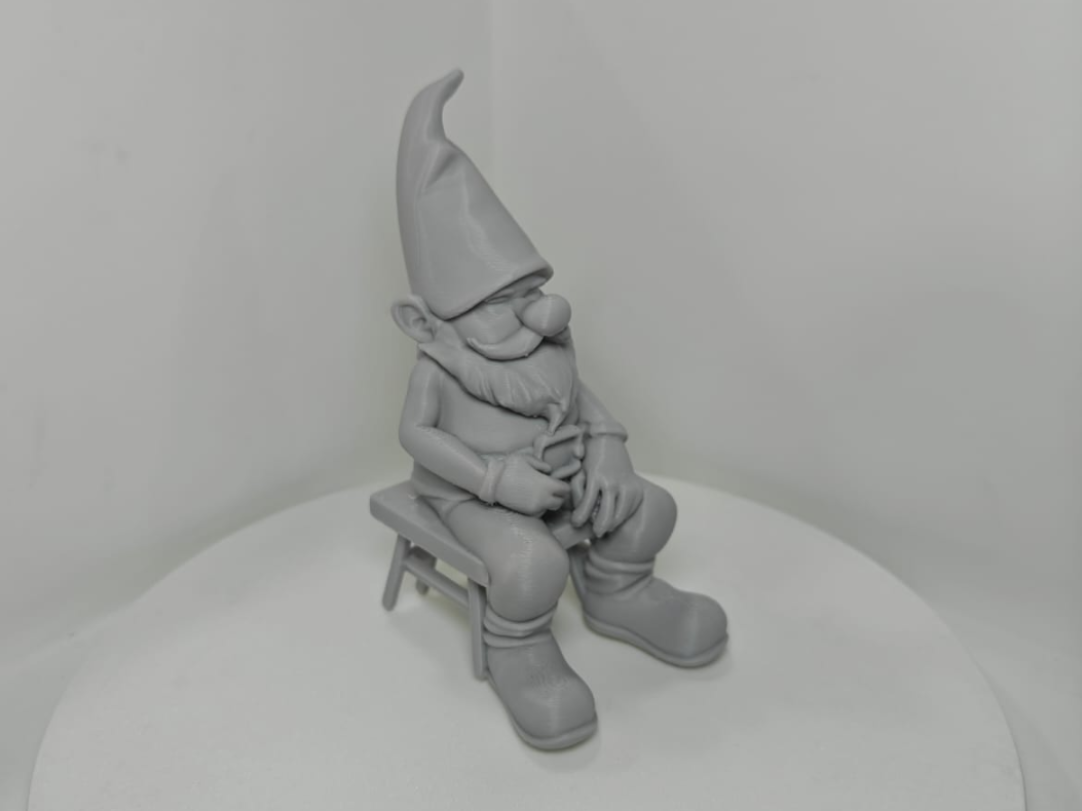 Garden Gnome Sitting on Chair Sleeping
