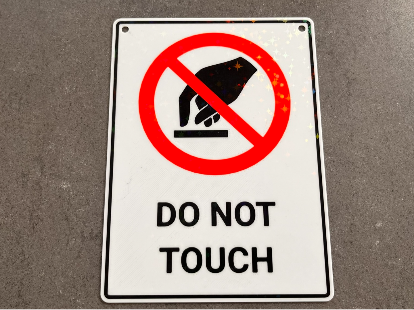Verbotsschild "Do not touch" in English mit AMS