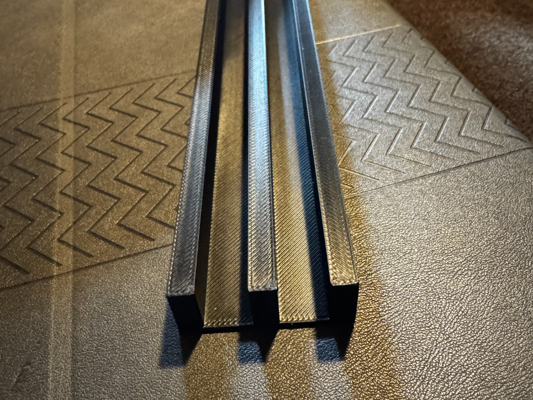 Wet art panel carrier rails