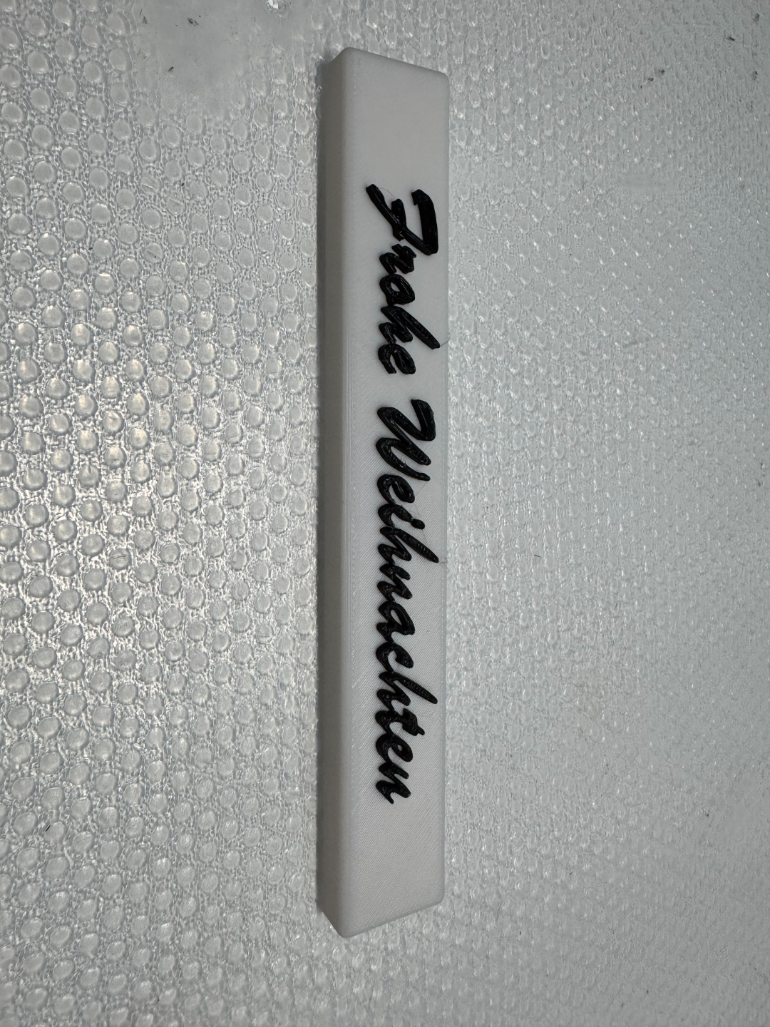 Klötzchen mit Schriftzug
