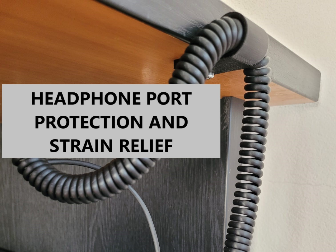 Coiled headphones cable holder and strain relief
