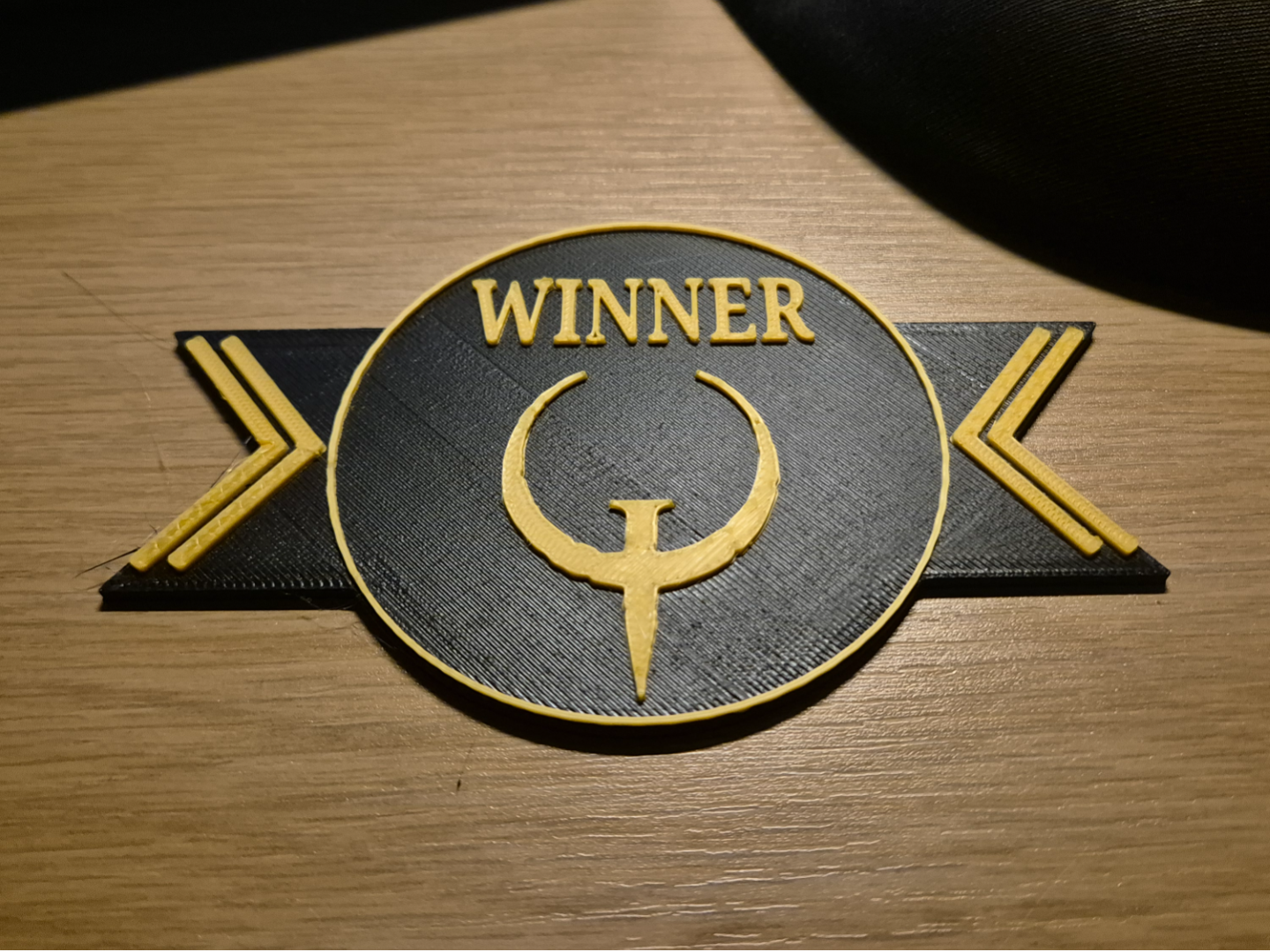 Quake winner emblem