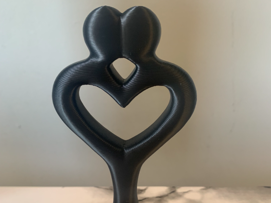 Couple togetherness sculpture