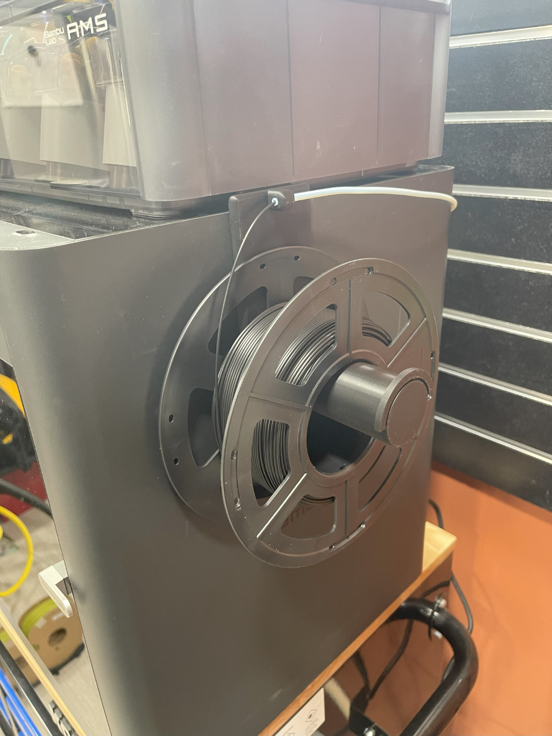 Reversable Side Mount Spool Holder for X1, X1C, P1P, P1S using AMS to secure with PTFE tubing holder