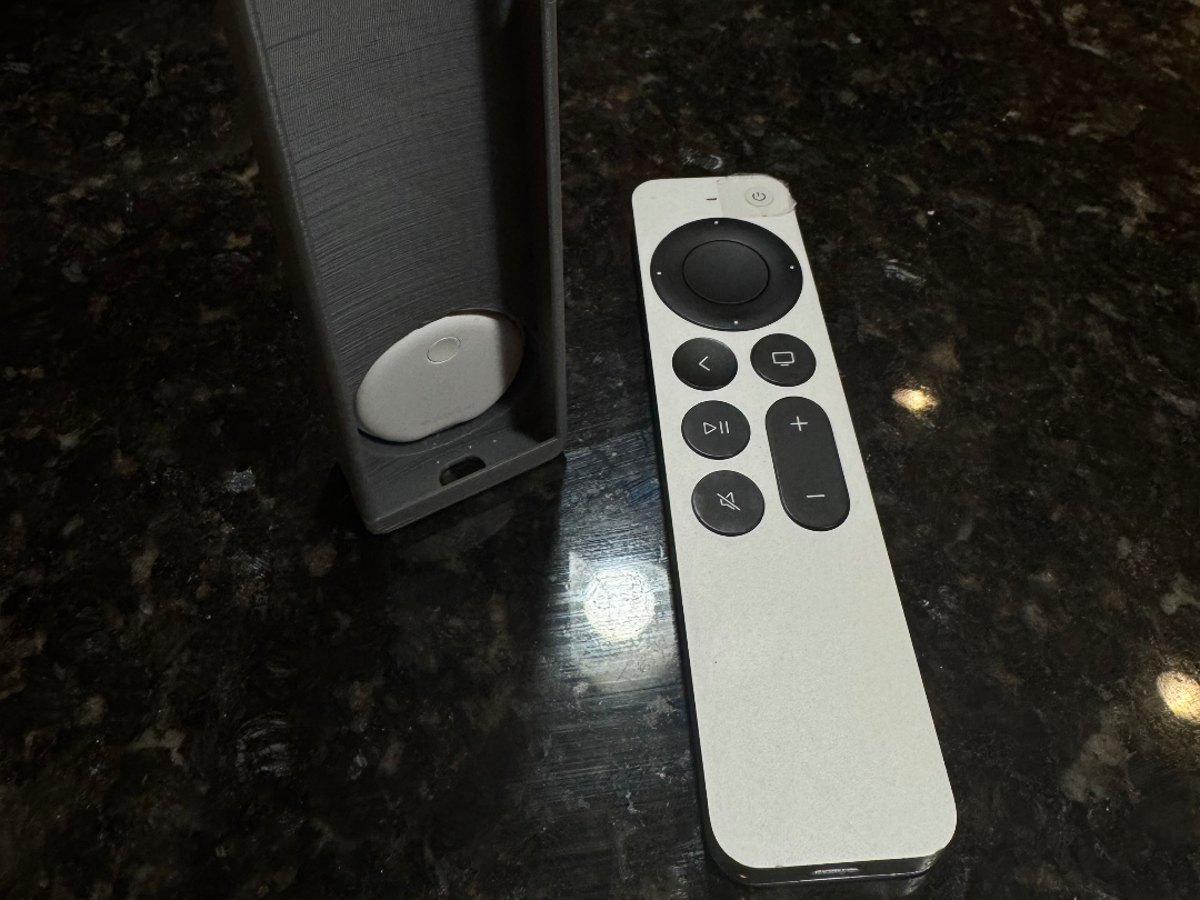 Apple TV remote case with Insignia Locator Tag