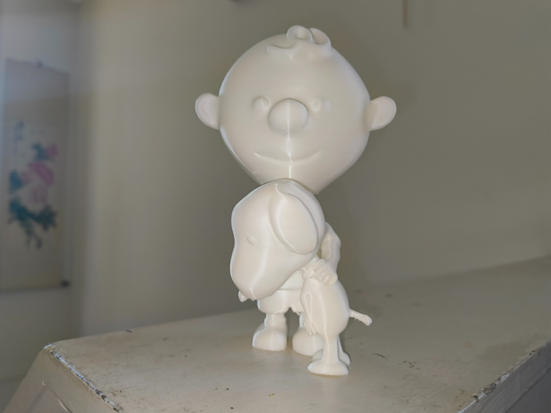 Snoopy and Charlie Brown hugging