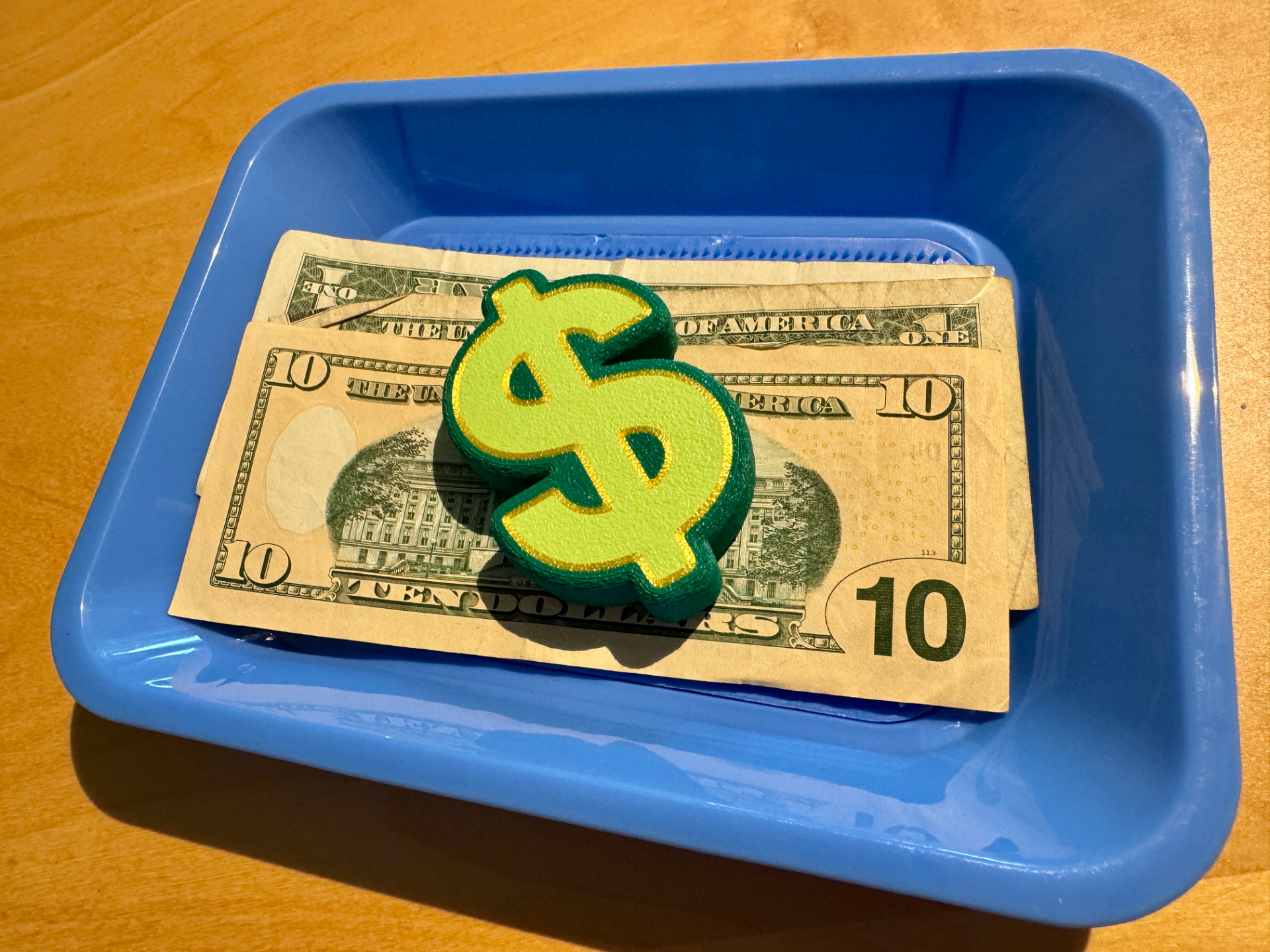 Dollar sign paperweight