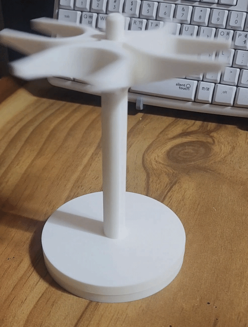 Rotating razor holder, rotating razor stand