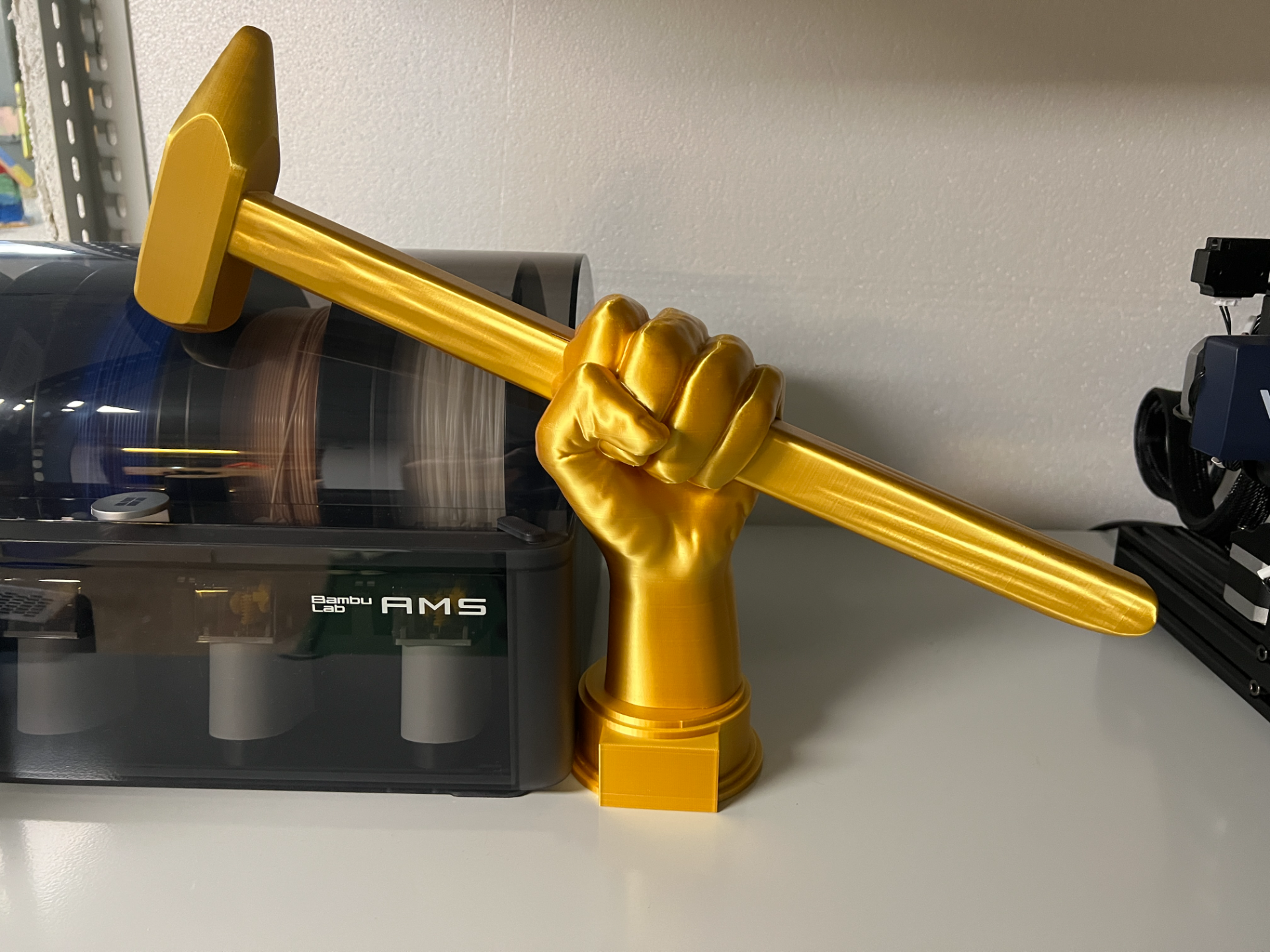 Trophy - Hand holding hammer