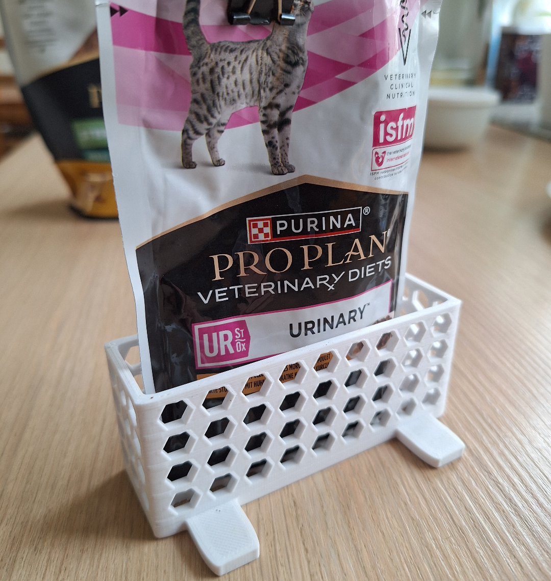 Basket for cat food sachets