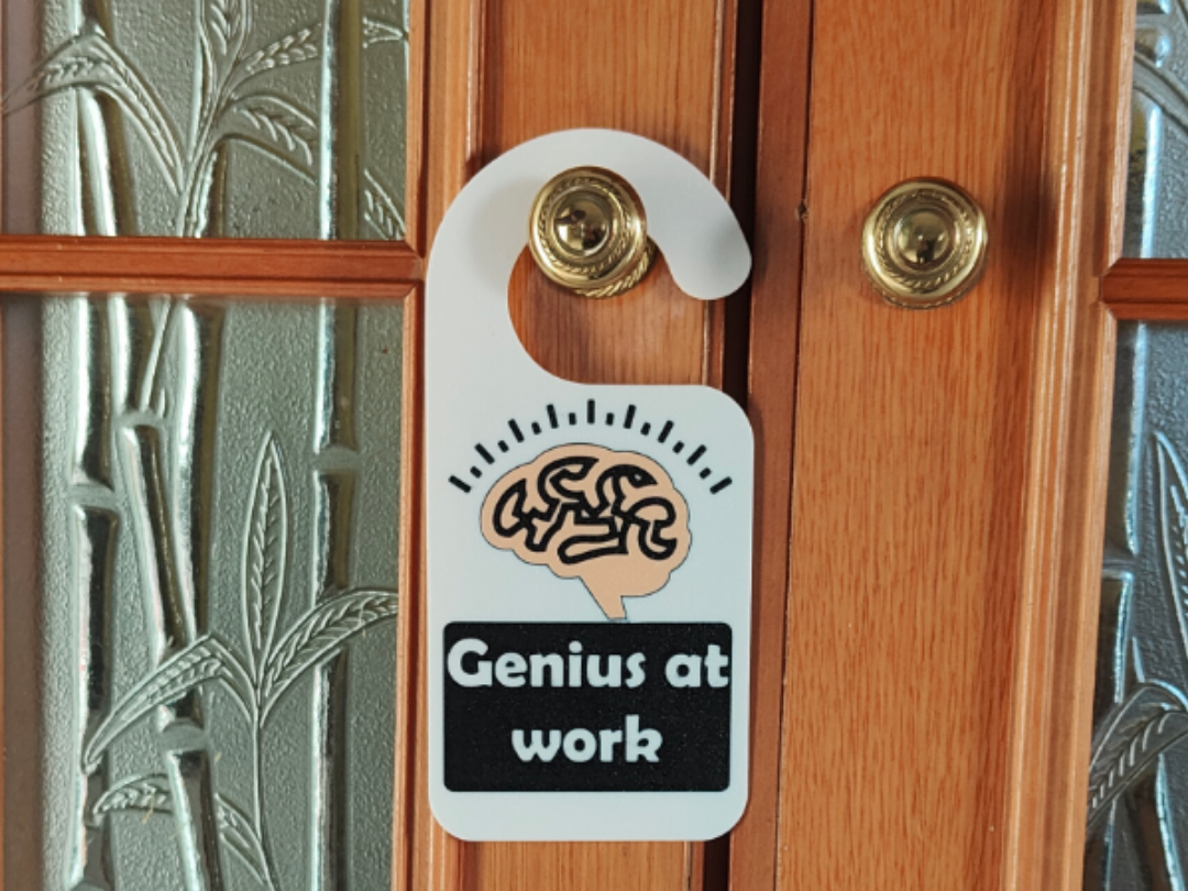 genius at work sign