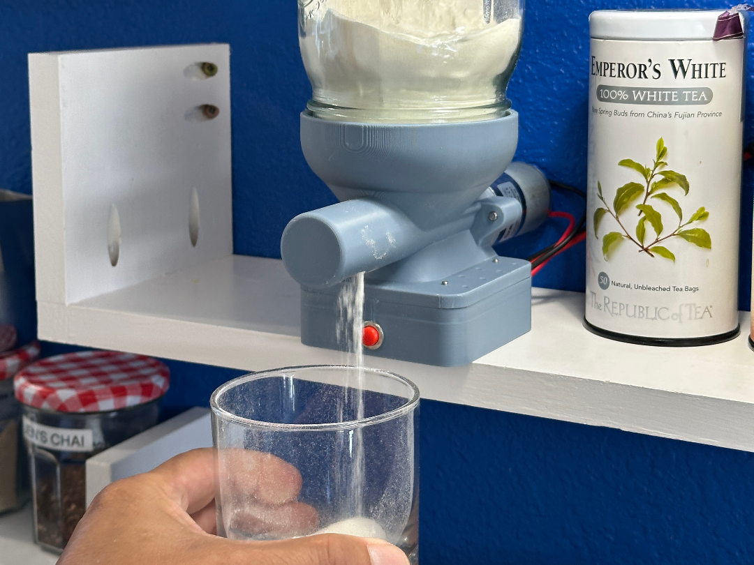 Coffee creamer motorized dispenser
