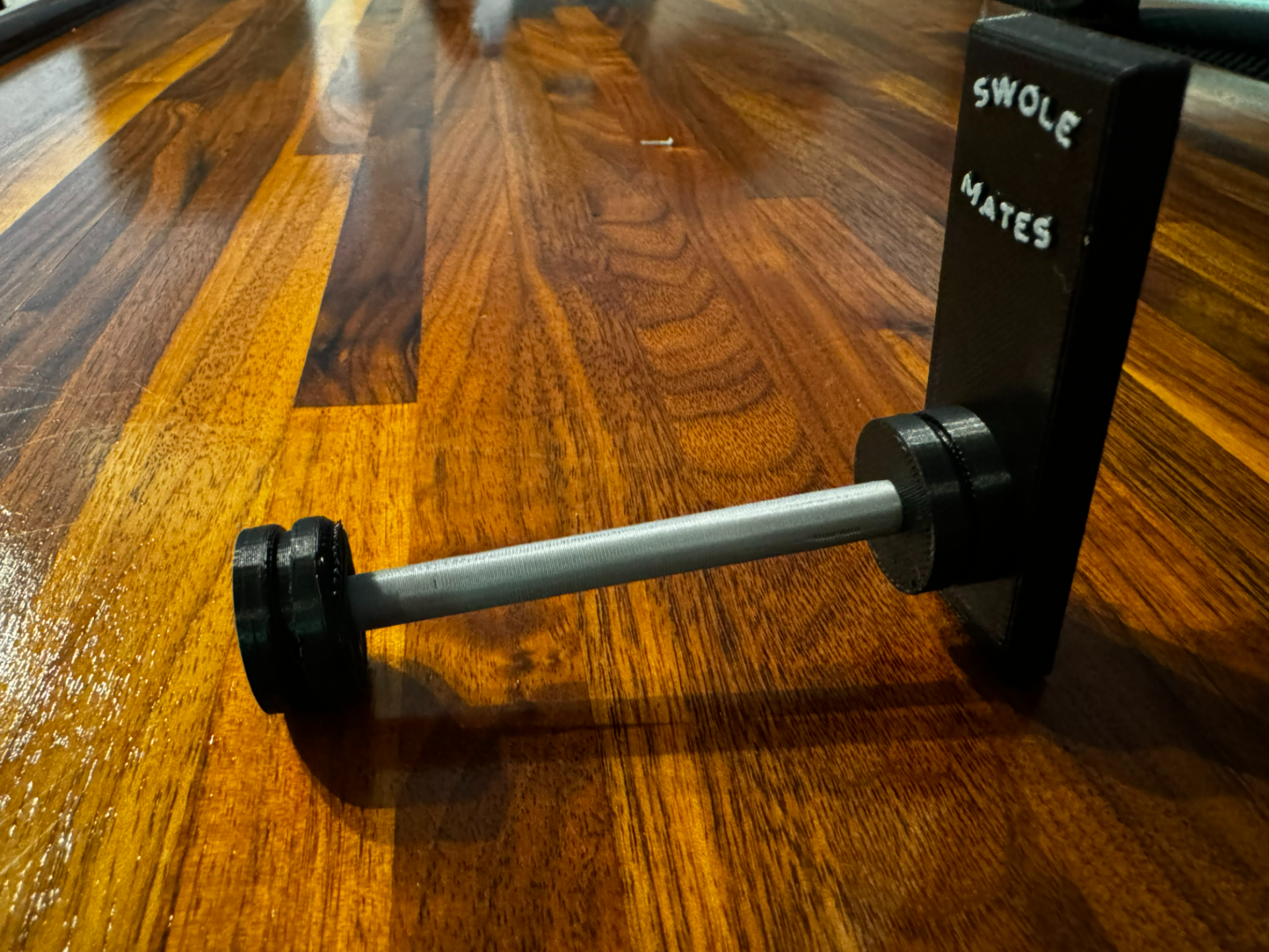 Home gym themed wall hook for workout accessories