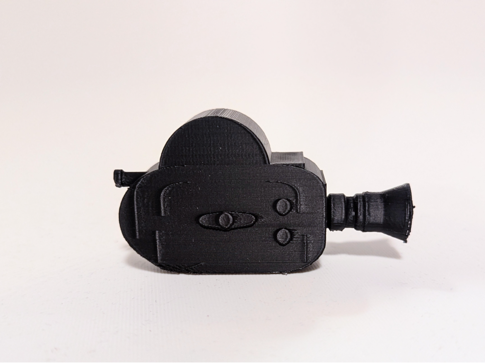 Miniature vintage analog 16mm film camera