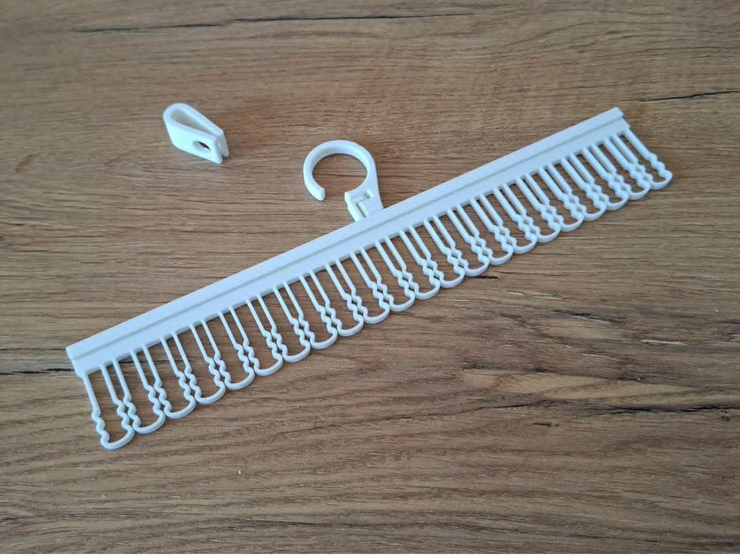 Clothesline socks hanger
