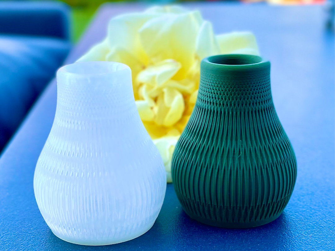 Small intricate patterned vase for single flowers