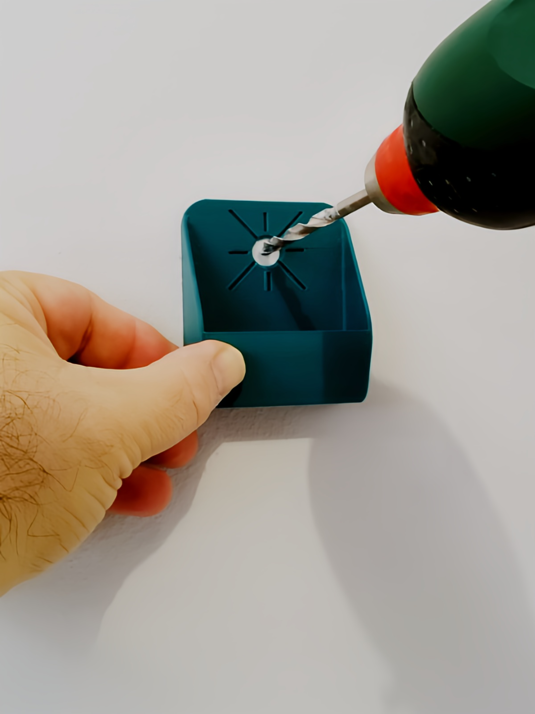 Recogedor de polvo de pared para taladro.