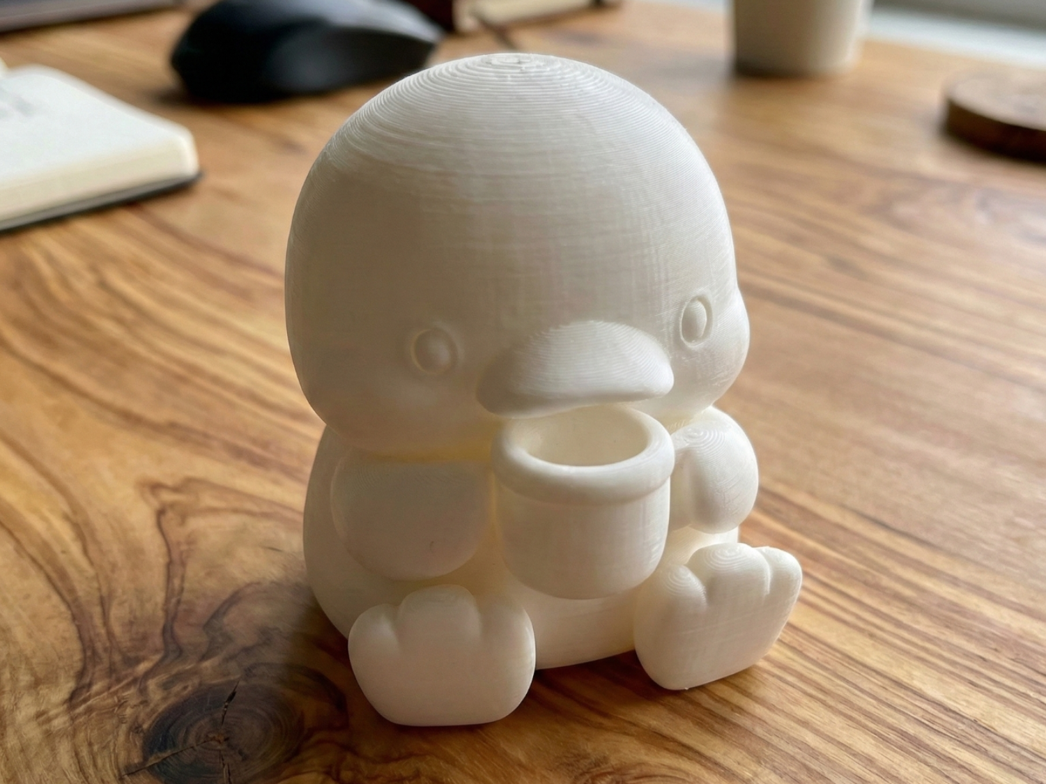 Cute Sitting Duck with Cup