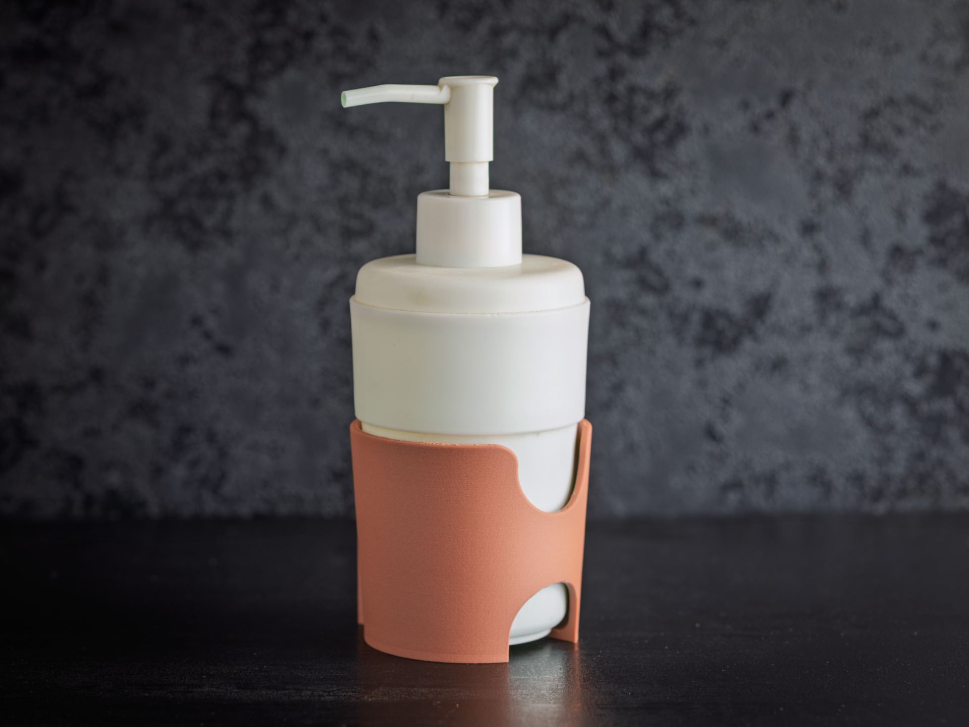 Shower gel bottle wall holder.