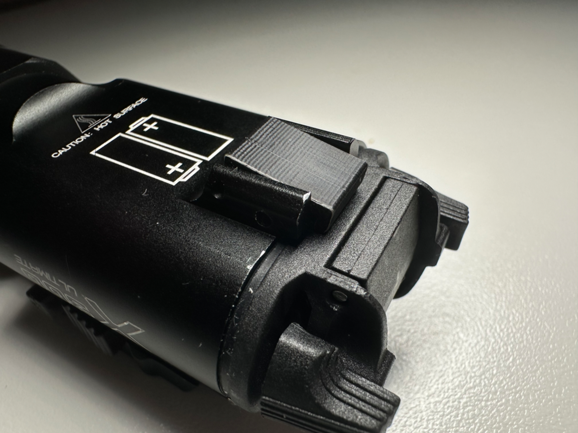 Surefire X300 gancio vano batteria