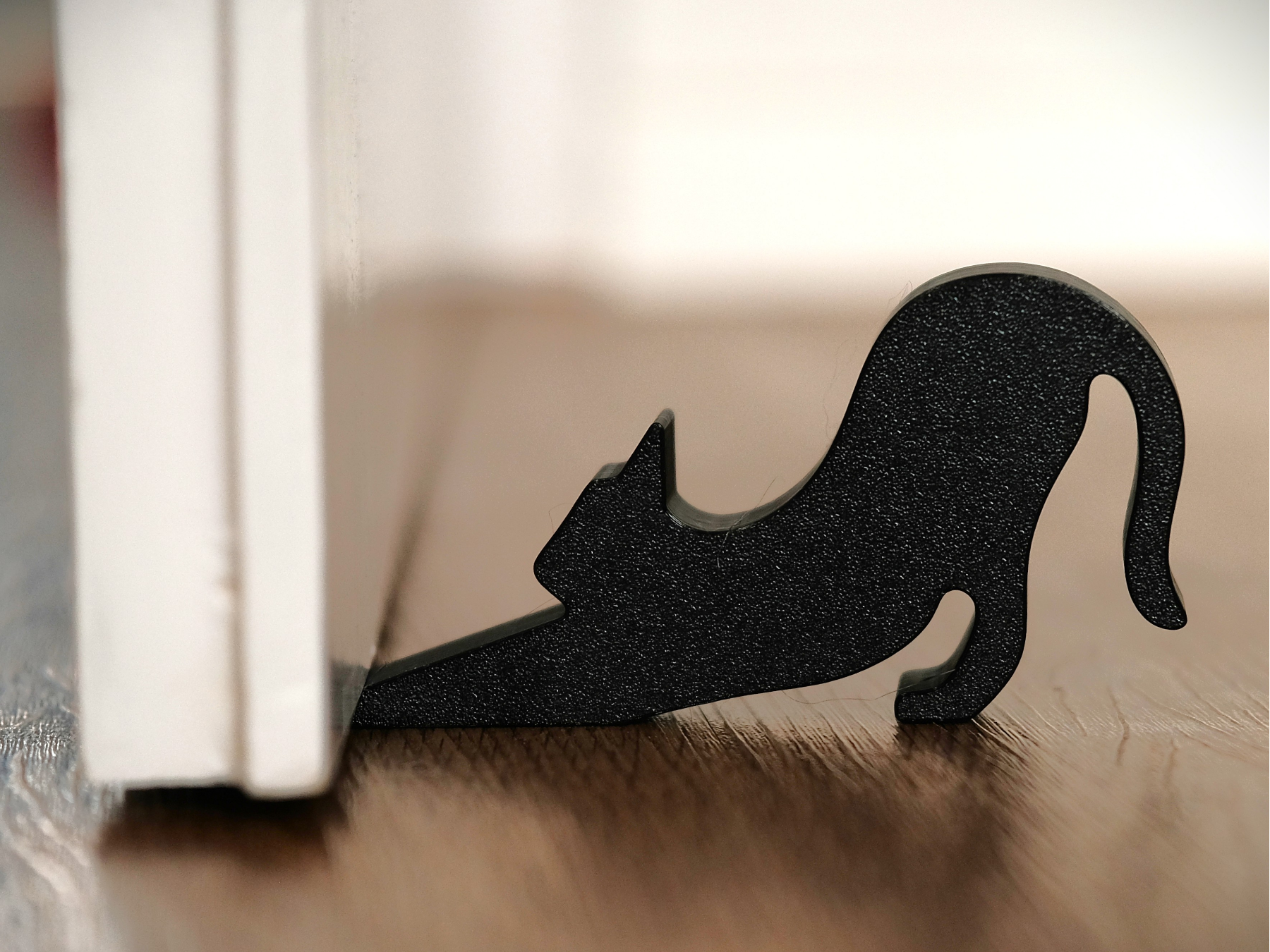 Cat Doorstopper