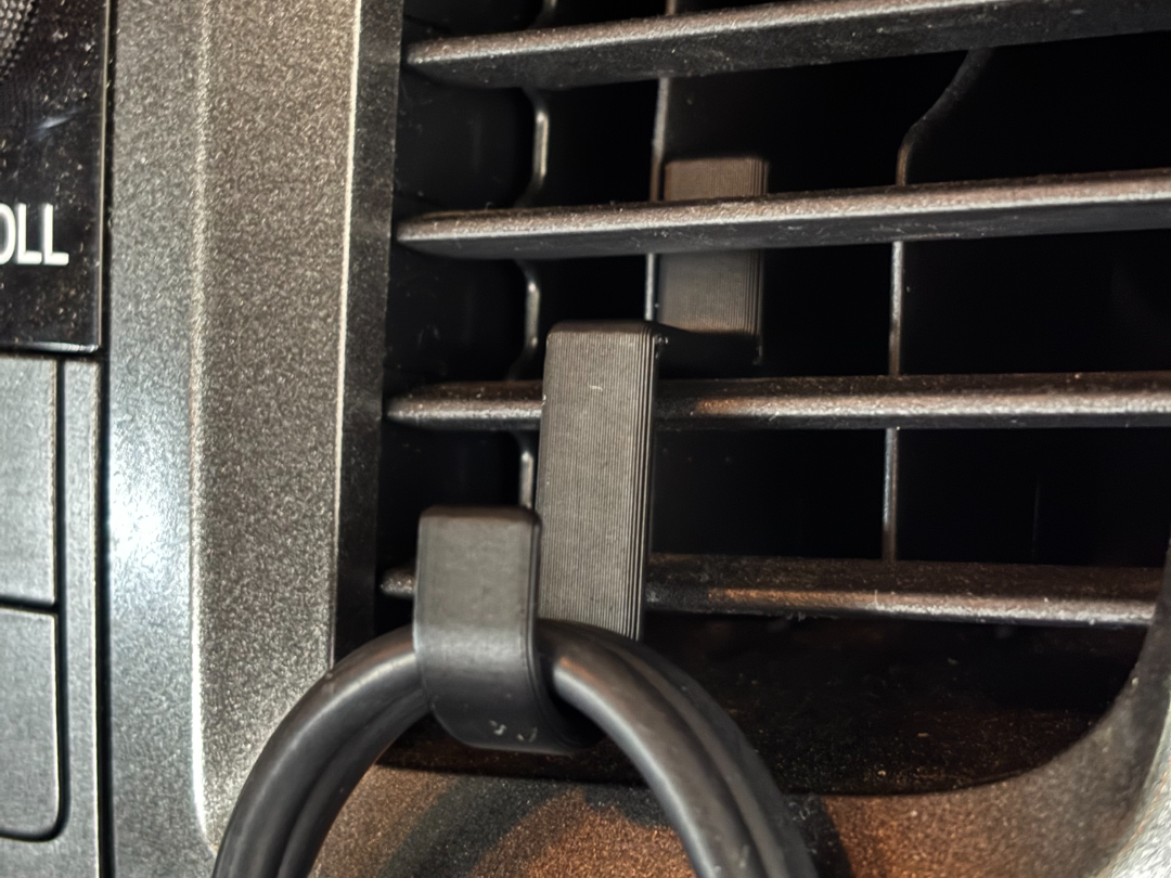 Car vent cable hanger