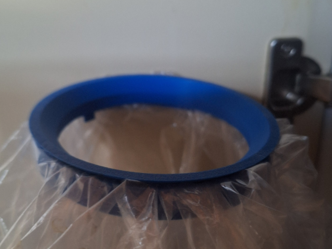 Mountable Circular Plastic Bag Holder