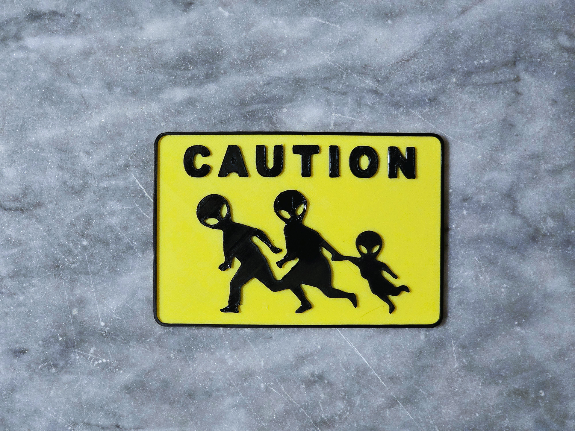 Alien crossing sign