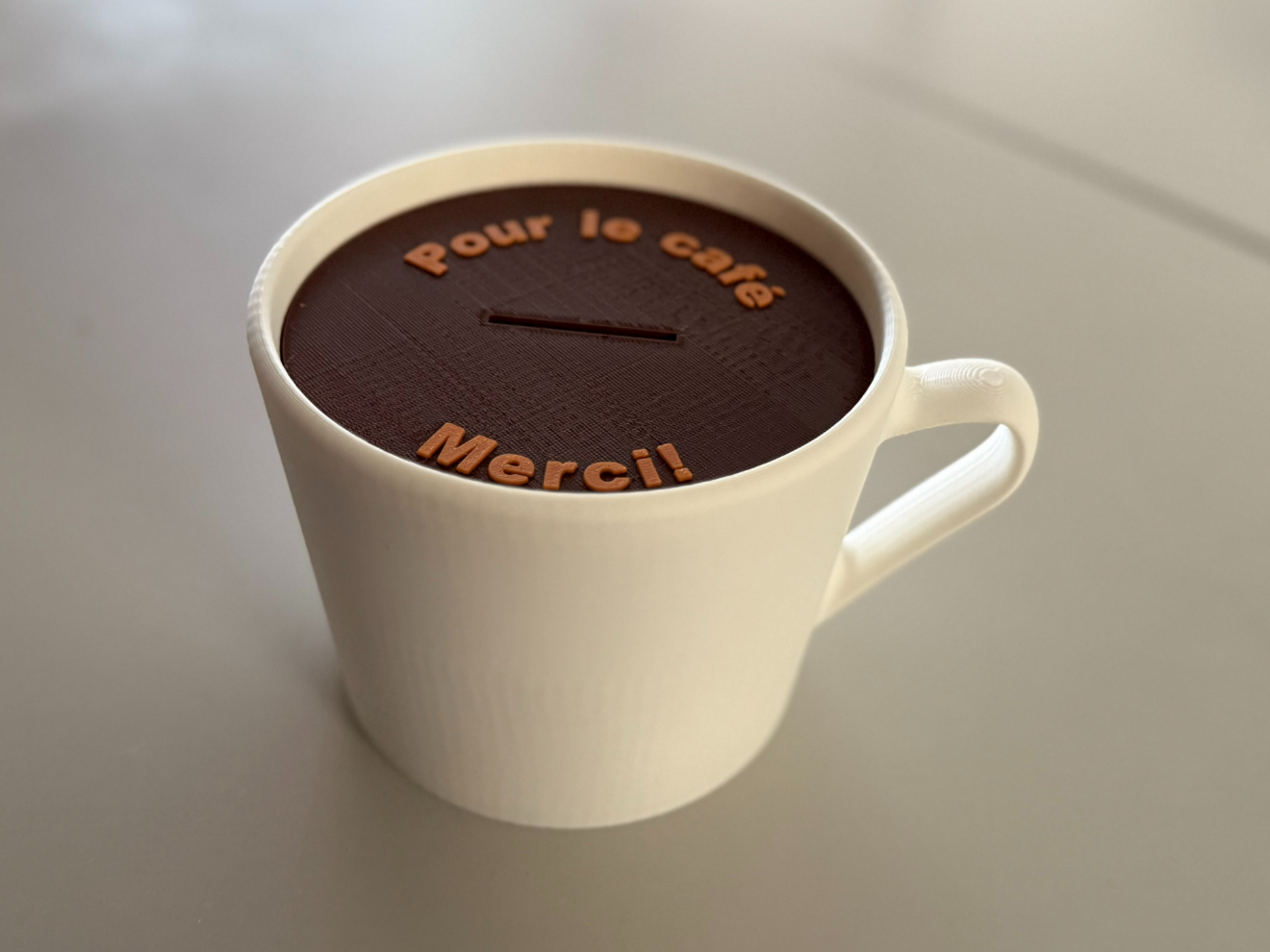 Tirelire en forme de tasse à café