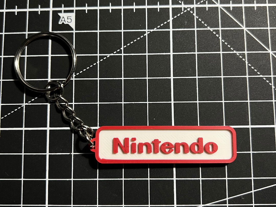 Keychain Nintendo V2 - Logo Multicolor Swap