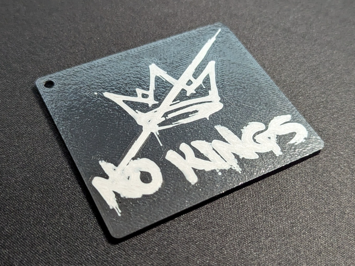 No Kings keychain/magnet/pin