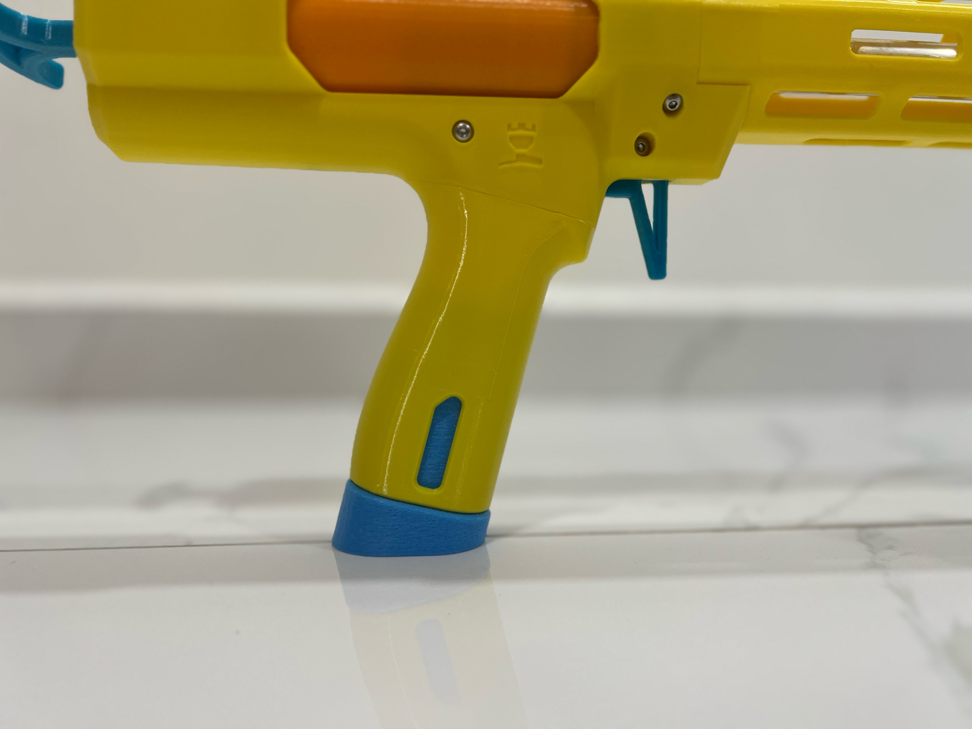 Grip insert for Squire blaster