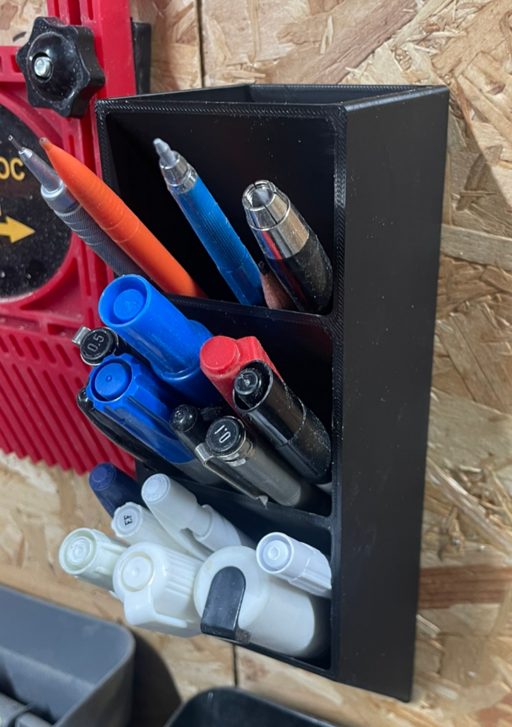 Wall mounted pencil holder
