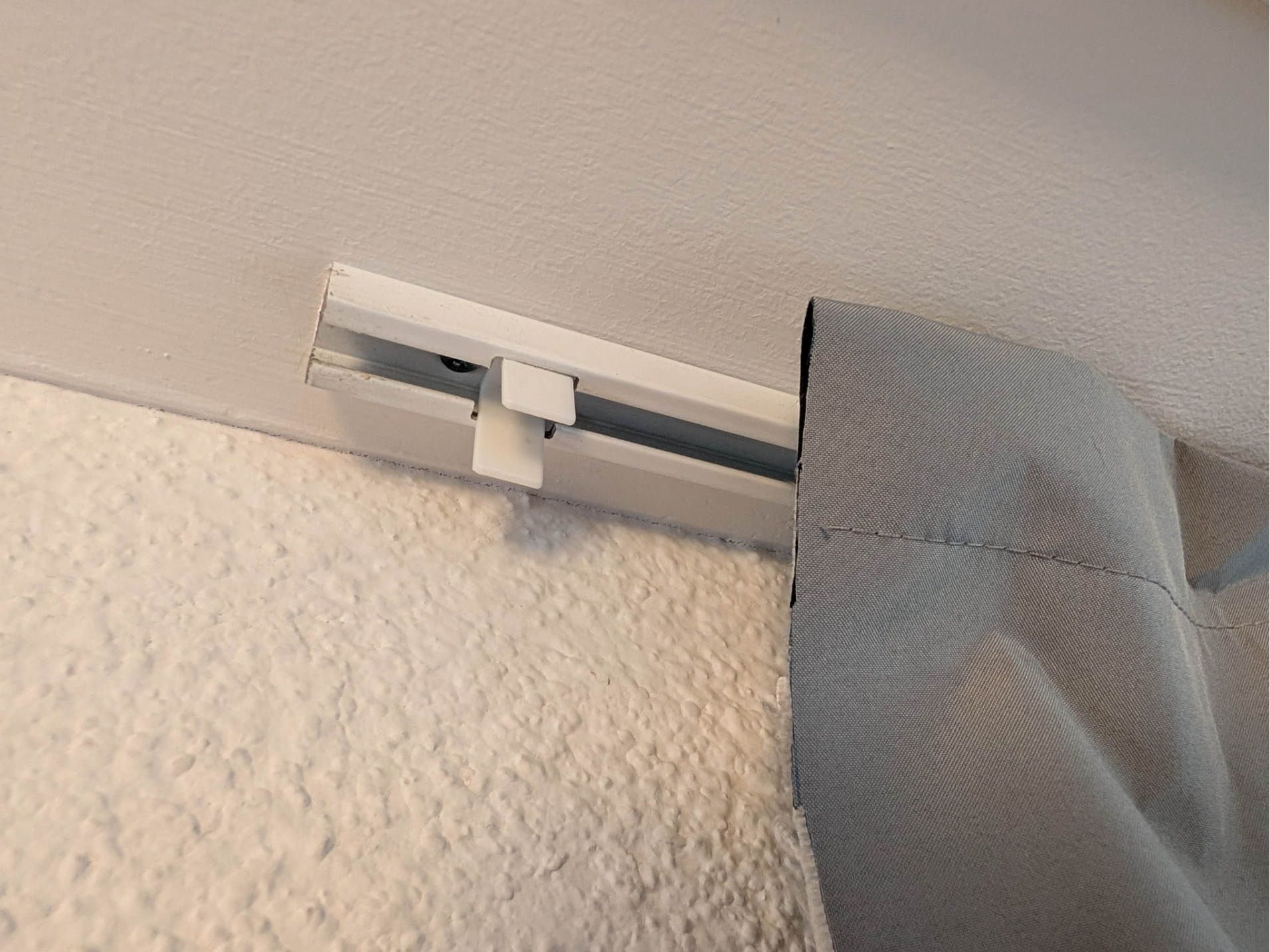 Curtain rail stopper
