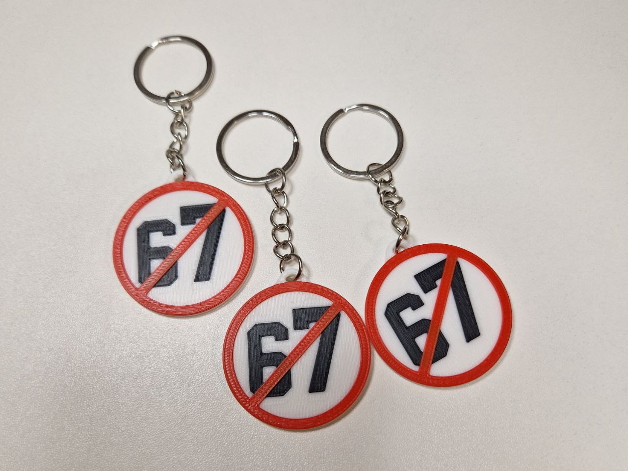 NO 67 sign keychain