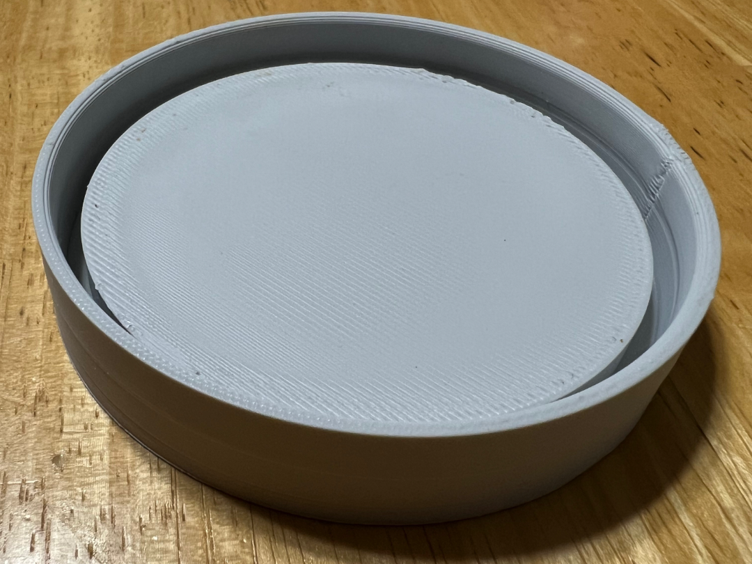 3D printed silicone mold for yogurt cup cap.